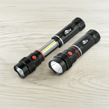 LED Flashlight on a wood table.